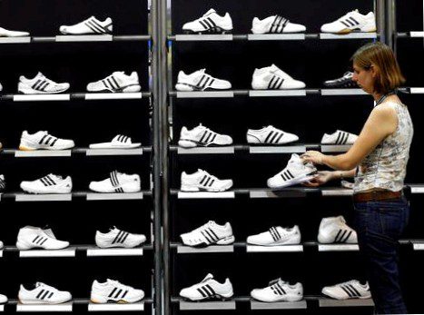 Adidas sticks with troubled reebok despite profit slump